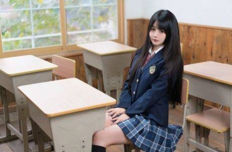 Pretty schoolgirl does a hot tease wearing a slutty uniform and stockings - #5