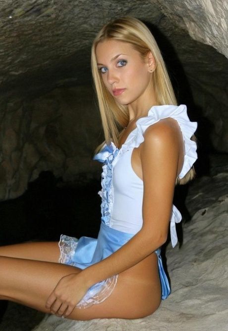 AI generated blonde with blue eyes gets mostly naked while in a cave - #15