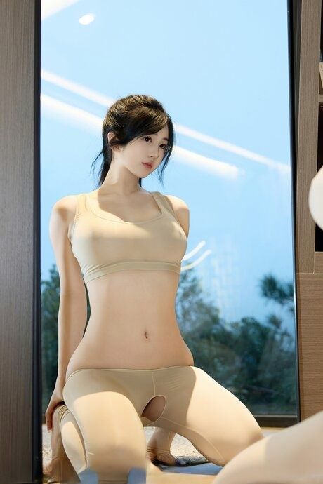 Beautiful Asian girl uncovers her nice set of tits during solo action - #4