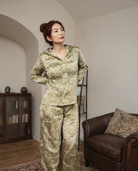 Redheaded Asian woman strips to stand in the nude before changing outfits - #2