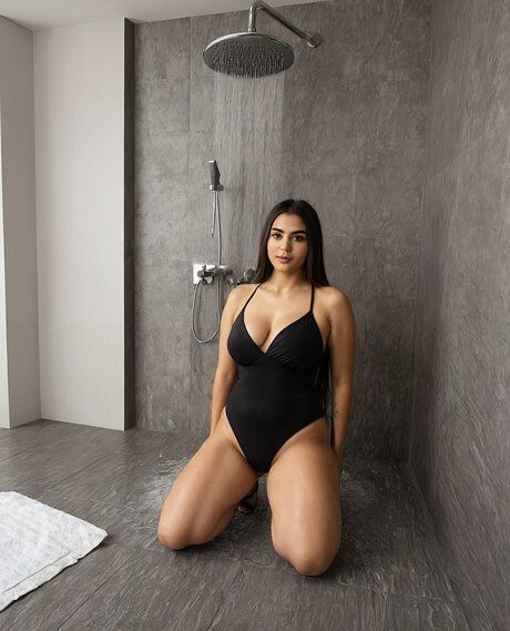 Plump Indian chick gets naked in a bathroom while changing her clothes - #1