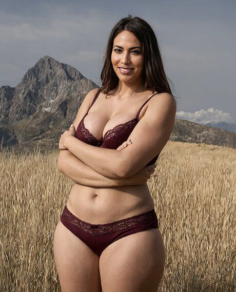Curvy brunette gets totally naked in the wilderness with her boobs out - #7