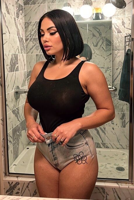 Solo girl takes selfies while showing her big natural tits in the bathroom - #1