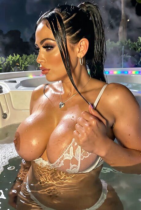 Hot girl with a great body shows her enhanced boobs in a hot tub - #14