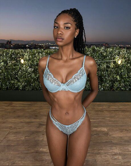 Hot black girl takes off her clothing to model in the nude on a penthouse deck - #3