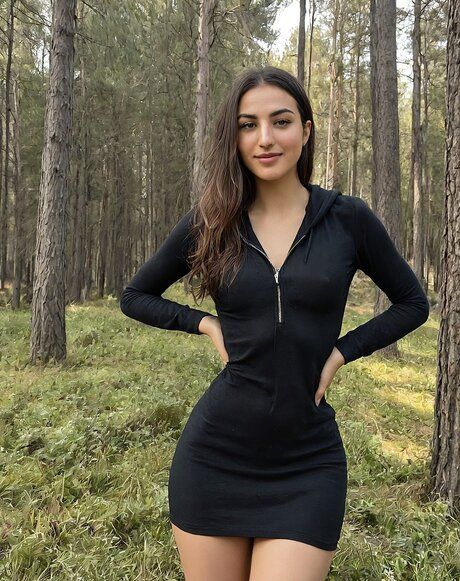 Beautiful girl strips to her birthday suit in a forest setting - #4