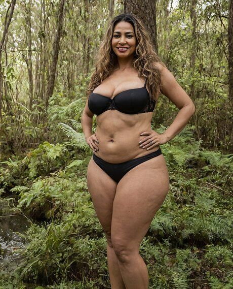 Fat brunette gets naked in the woods after posing in a bikini - #3