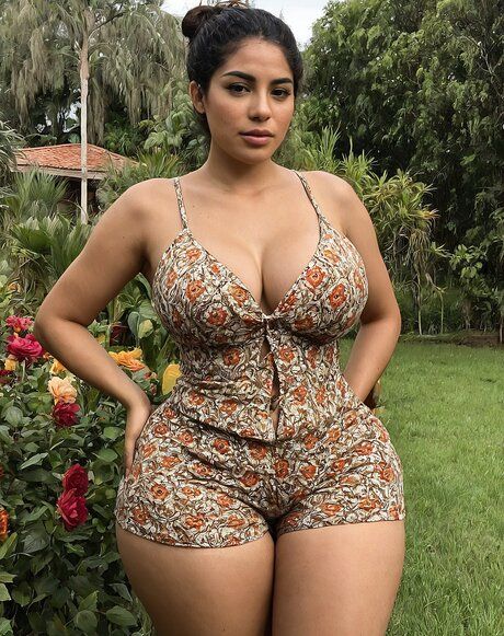 Fat brunette removes her lingerie and stockings to go nude on a lawn chair - #3