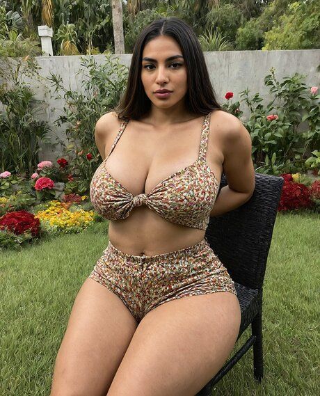 Fat brunette removes her lingerie and stockings to go nude on a lawn chair - #2