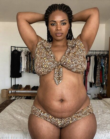Black girl with a big belly takes off her lingerie to model in the nude - #3