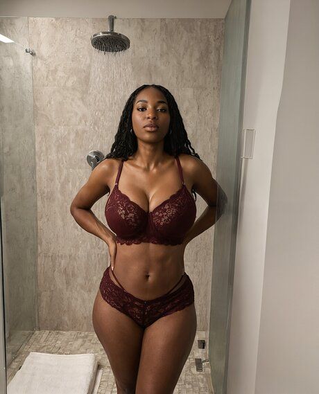 Pretty black girl removes a bodystocking to go nude in a bathroom - #7