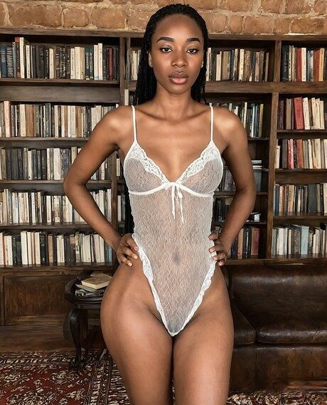 Curvy black girl gets completely naked in a library filled with books - #5