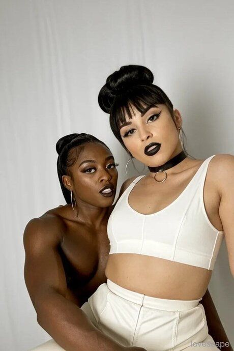 Beautiful women indulge in interracial threesome in the nude - #1