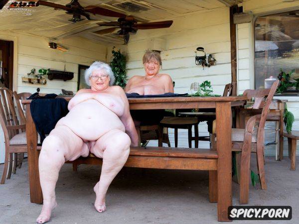 Naked 80 year old fat lady sitting posing her huge tits on the table photo in high definition - spicy.porn on pornintellect.com