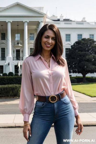 Pink blouse, belt, denim jean, high heels, posing in front of white house, hands in pockets - ai-porn.ai on pornintellect.com