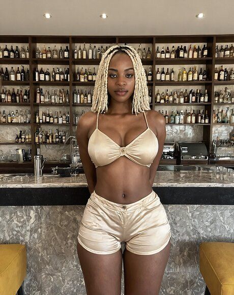 Black solo girl models non nude and nude poses in a bar setting - pornpics.com on pornintellect.com