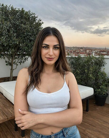 Beautiful brunette MILF models totally naked on a patio overlooking a skyline - pornpics.com on pornintellect.com